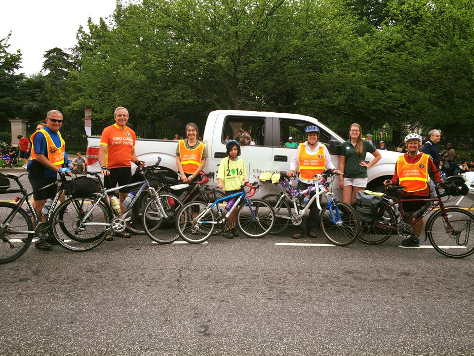Volunteers with bikes pose for a picture at Chesapeake and Ohio National Historical Park in Maryland 