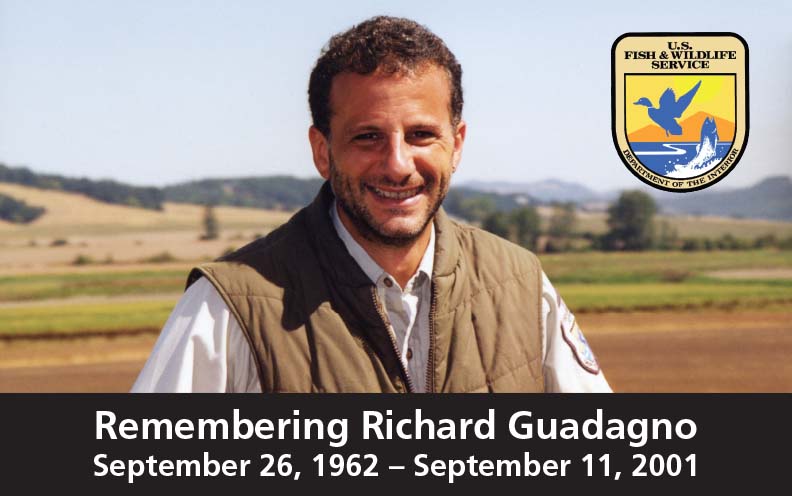 Photograph of U.S. Fish and Wildlife Service employee Richard Guadagno with the USFWS seal at right and his life dates below