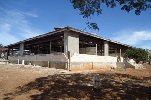Exterior construction on a scaffolded headquarters building.