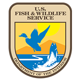 U.S. Fish & Wildlife Service logo with a flying duck and leaping fish against a sun and water background