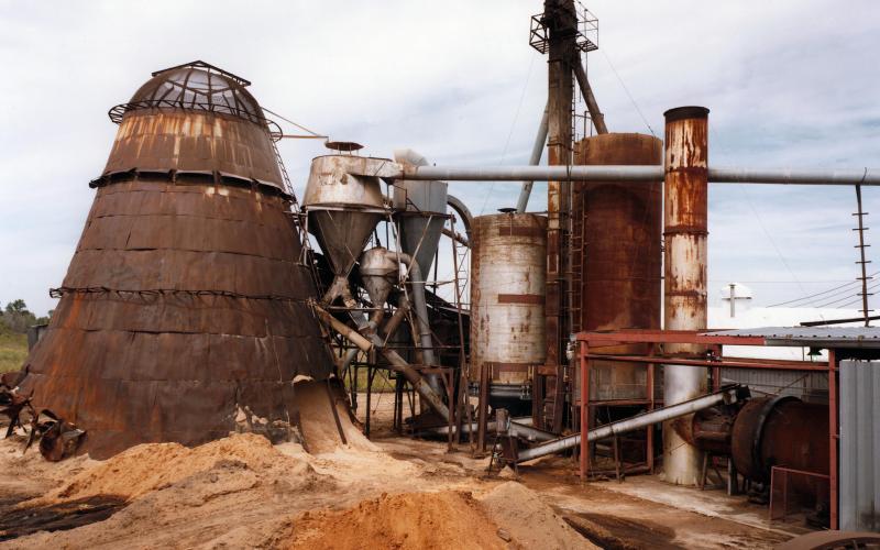 Sawdust being processed to produce more usable forms of biomass. 