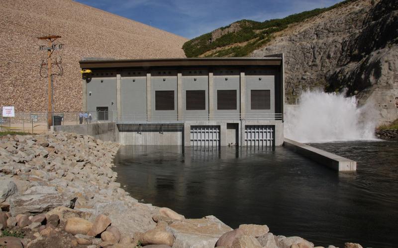 View of Jordanelle Hydroelectric Power Plant looking upstream across Provo River toward Jordanelle Dam