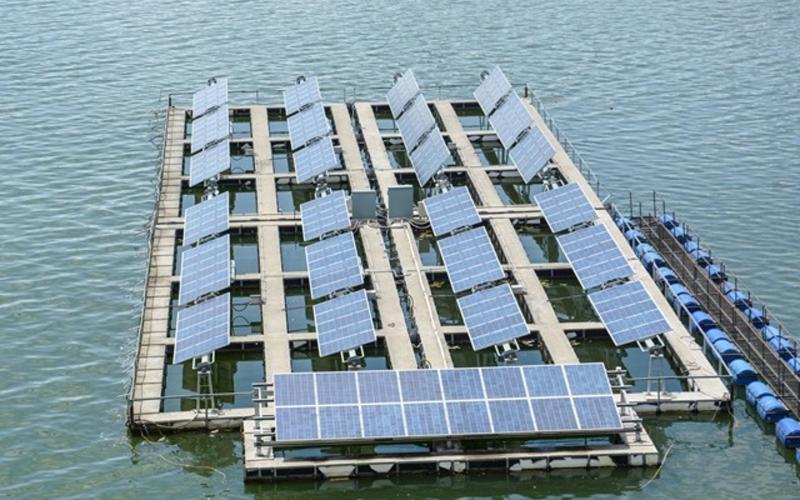Solar panels floating in the ocean.