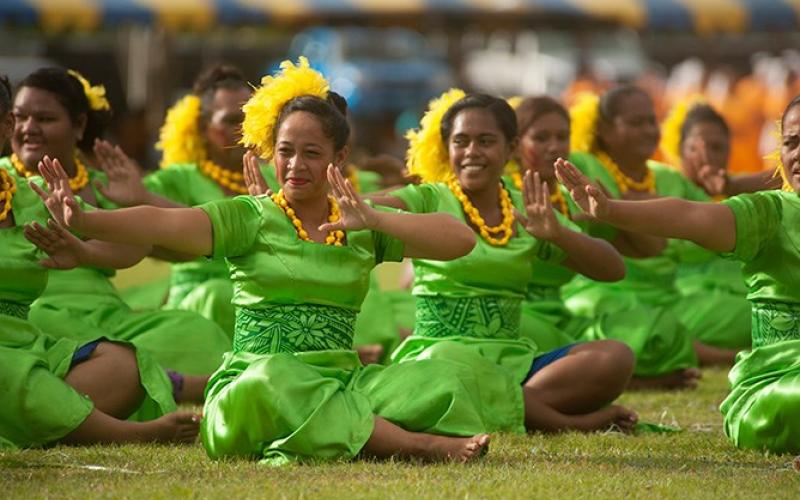 Samoan women perform a traditional dance.
