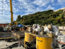 Construction workers mixing grout to support stabilization of the Alcatraz Warf.