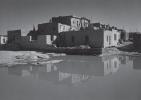 Black and white photograph by Ansel Adams of Acoma Pueblo