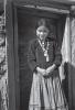 Black and white photograph by Ansel Adams of a Navajo girl