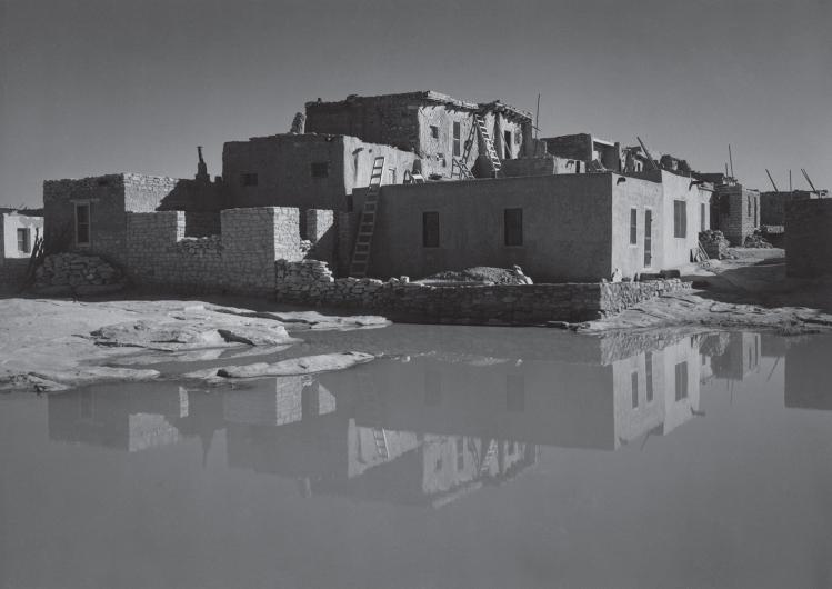 Black and white photograph by Ansel Adams of Acoma Pueblo