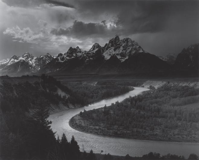 Black and white photograph by Ansel Adams of the Snake River 