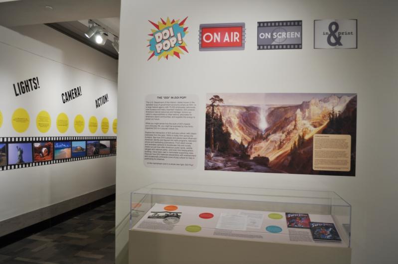 Title wall and introductory panel and vitrine for the "DOI Pop!" exhibition