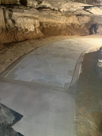 New stone walkway inside cave trail.