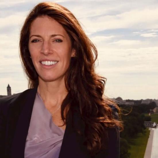 Portrait of Kate MacGregor in front of Washington Monument