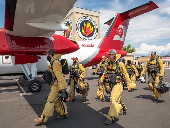 Smokejumpers prepare to board plane at the National Interagency Fire Center in Idaho. Photo by Neal Herbert, DOI.