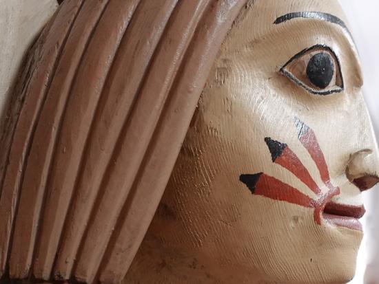 carved, painted detail from "The Chief's Daughter" story pole