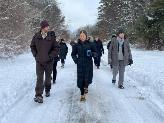 Secretary Haaland walks with U.S. Fish and Wildlife Service staff at the Great Bay National Wildlife Refuge in New Hampshire. 