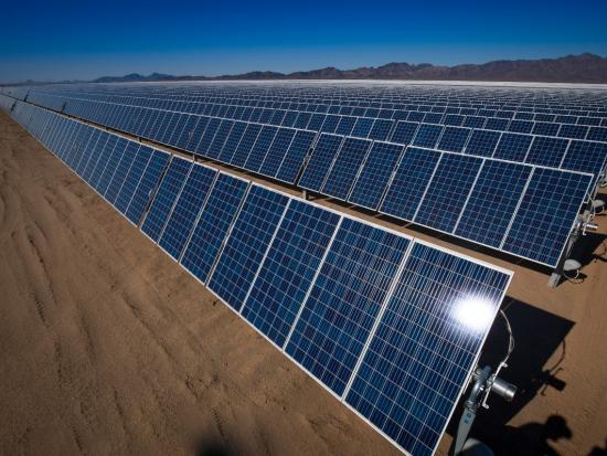 Rows of solar panels line the desert in California
