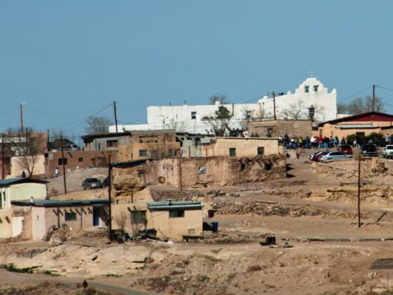 Native American community with power poles and power lines