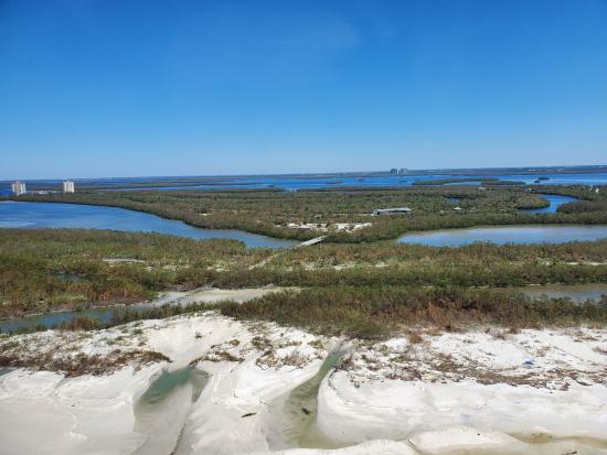 View of beach park and pedestrian bridge post Hurricane Ian in September 2022. 