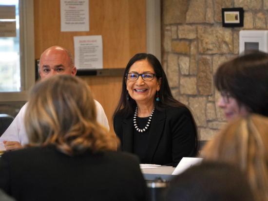 Secretary Haaland smiles towards the camera