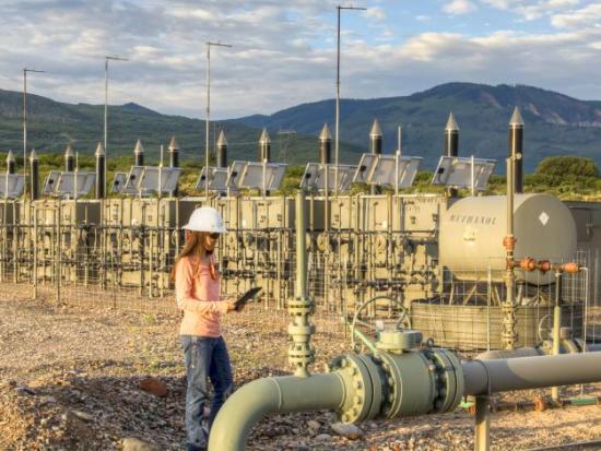 Oil and Gas equipment in mountain desert landscape