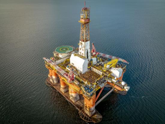 Sunset view of an oil and gas platform rig