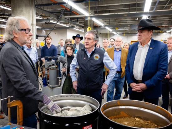 Secretary Burgum and Congressman Ryan Zinke with crowd. 