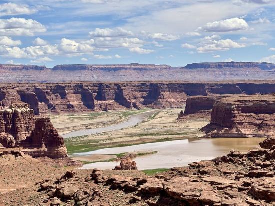 Desert Canyon with cloudy blue sky. 
