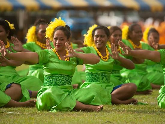 Samoan women perform a traditional dance.