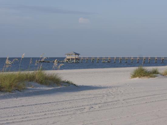 Mississippi Gulf Coast, beach view looking out at dock in the water