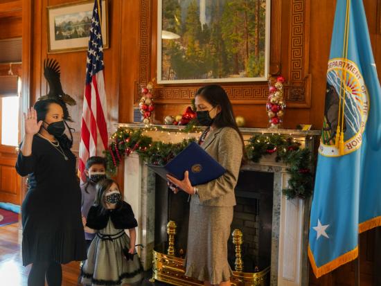 Camilla Touton is sworn in by Secretary Deb Haaland.