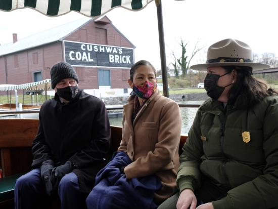 Secretary Haaland takes a boat tour to see the first-ever working aqueduct on the canal.