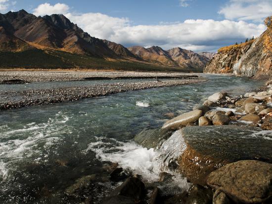 The Toklat River in Denali National Park with mountains in the background.