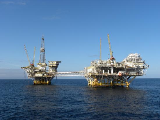 Two platforms -- Ellen and Elly -- offshore near Long Beach, Calif in BSEE’s Pacific Region. Ellen (right) is a production platform connected by a walkway to Platform Elly (left), a processing platform for both Ellen and another platform, Eureka.