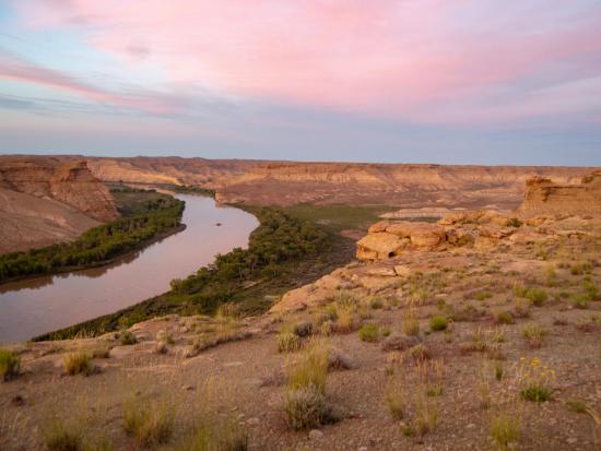 A view from a ridge looking over the Green River and other bluffs. 
