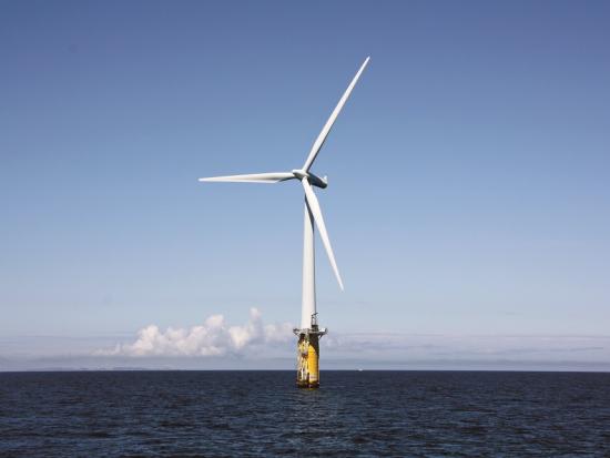 A wind turbine floating offshore. 