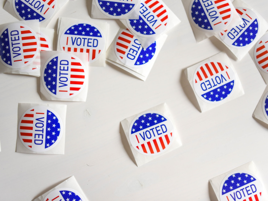 Picture of "I Voted" stickers on a white table