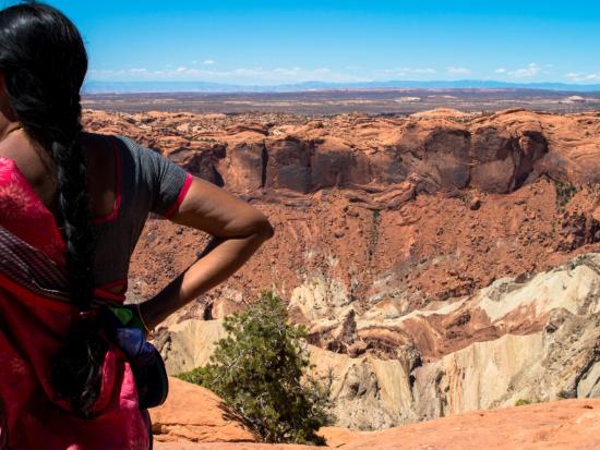 Person standing at edge of Canyonlands National Park
