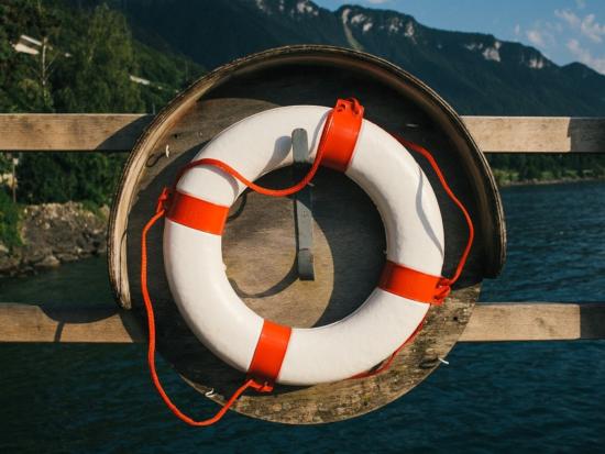 Life preserver ring on pier