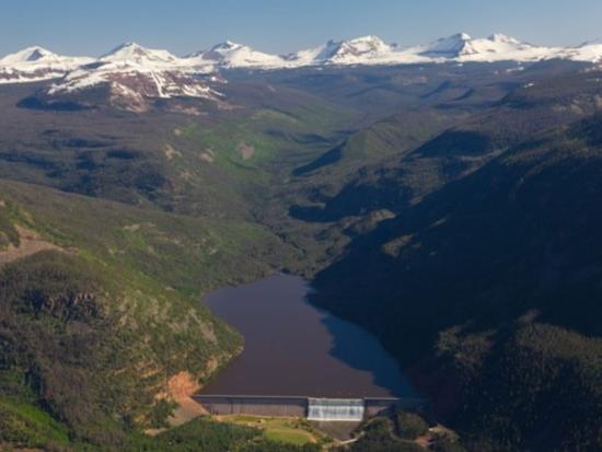 A view of Upper Stillwater Reservoir and snowcapped Uintah Mountains. 