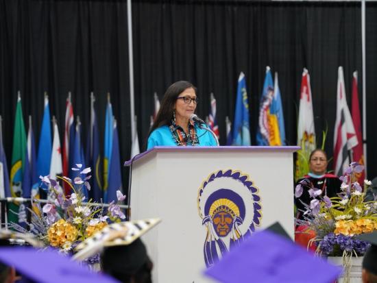 Sec Haaland delivers the 2022 commencement address to Haskell Indian Nations University graduates.
