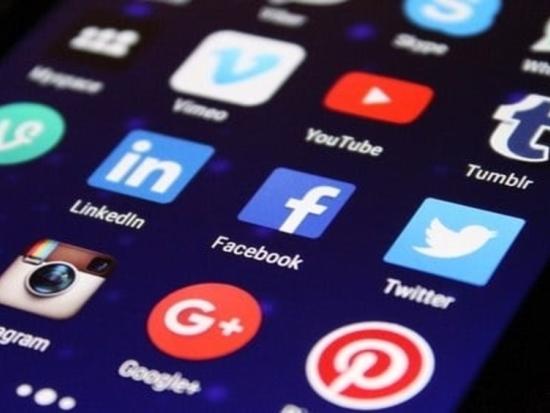 Picture of social media company logos on phone screen