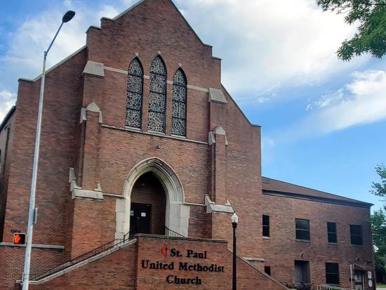 Front of a brick church with a sign that reads "St. Paul United Methodist Church"
