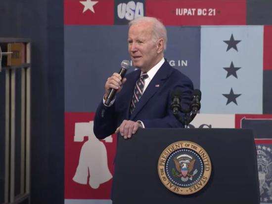 President Biden speaks to a crowd as he announces his budget for fiscal year 2024