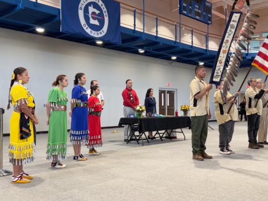 Interior leaders and Tribal members stand for presentation of the colors 