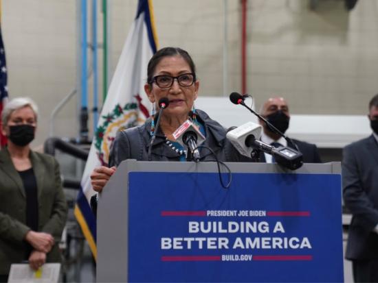 Secretary Deb Haaland at podium with others in West Virginia