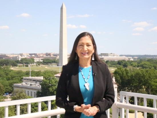 Sec. Deb Haaland with Washington Monument