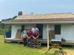  NPS Staff & TTAP Interns pose in front of the house as repairs near completion