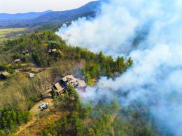 A prescribed fire in the Great Smokey Mountains National Park helps protect homes. Photo by NPS.