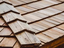 Wood shake or shingle roofs can increase risk from wildfires. Photo by Pantira through Adobe Stock.