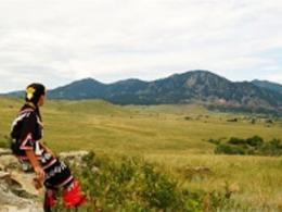 Native American Child looks across mountains